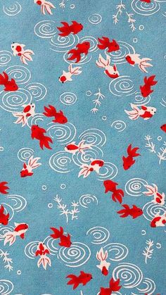 a blue background with red and white fish on it's side, in the middle of swirling waves