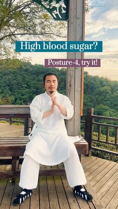 a man sitting on top of a wooden bench next to a sign that says high blood sugar