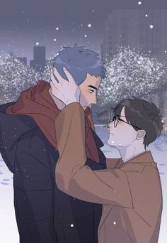 two people standing in the snow with their arms around each other and one person holding his head