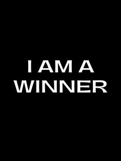 the words i am a winner against a black background