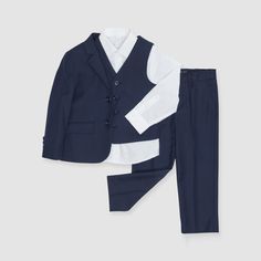 It would be hard to find anything more classic than our kids' navy suit! This suit is perfect for a ring bearer on the wedding day and can be worn again for school events or special holidays. This boy's navy blue four-piece suit set is available in toddler and youth suit sizes 2T to 10. Royal Blue Suit Wedding, Navy Suit Wedding, Wedding Planning Board, Grooms Party, Girl Ring Bearer, Flower Girl Ring Bearer, Wedding Navy, Tuxedo Women, Blue Suit Wedding