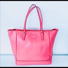 Coach Large Carryall Tote Style. Zip Top. Large Roomy Interior For Laptops, Extra Shoes Etc. 3 Interior Pickets, 1 With Zipper. Approximately 17” Wide X 13” Tall. 10.25” Handle Drop. Peachy Pink Color And Textured Leather. Comes With Original Dust Cover. In Like New Condition!! Used Only A Handful Of Times. Absolutely No Signs Of Wear/Scratches Etc. Makes For A Great Christmas Present!! Carryall Tote, Coach Tote, Peachy Pink, Tote Purse, Christmas Present, Dust Cover, Coach Purses, Zip Top, Womens Tote Bags