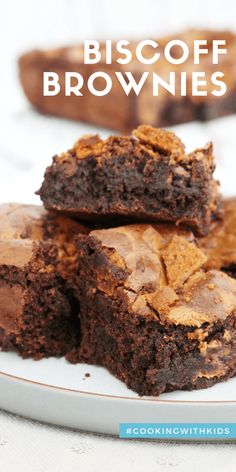 brownies stacked on top of each other on a plate with the words biscoff brownies