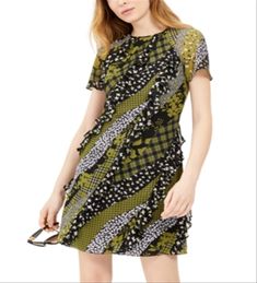 Michael Kors' '90s-inspired dress is destined for compliments in mixed prints and chic ruffles set on the bias| Pair it with everything from strappy sandals to sneakers to utilitarian boots| (Clearance) Jewel Neck Dress, Snake Print Dress, Ruffled Dress, Belted Shirt Dress, Midi Sheath Dress, Michael Kors Dresses, Necklines For Dresses, Jewel Neck, White Striped Dress