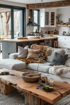 a living room filled with furniture and a wooden table