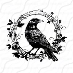 a black bird sitting on top of a branch in a circle with leaves around it