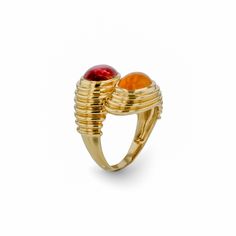 This opulent bypass ring showcases vibrant orange spessartite and pink tourmaline cabochons, set in a striking fluted 14K yellow gold band. With its bold colors and unique design, this piece is sure to make a statement.• Metal: 14K Yellow Gold• Orange Spessartite: 2.75ct• Pink Tourmaline: 2.75ct• Dimensions: 27.5mm Height, 22mm Length, 9.5mm Elevation Necklace Length Guide, Bypass Ring, Statement Drop Earrings, Orange And Pink, Tennis Necklace, Gold Bracelet Chain, Gold Orange, Gold Chain Necklace, Vibrant Orange