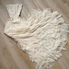 a white piece of cloth on the floor