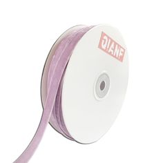 a roll of purple satin ribbon with the word diaf on it's side