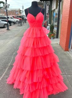 Oenology of charm and grace, this prom dress in a vibrant coral color is designed to turn heads. The cascading tulle layers create a dramatic and whimsical effect, perfect for making a grand statement. The deep V-neckline and thin straps add a touch of sophistication, while the fitted bodice highlights your waist, ensuring a flattering fit. This dress combines modern design with classic elegance, making it a versatile choice for any prom or formal event. With its bold color and exquisite detailing, this dress is sure to make you feel like a star from the moment you step into the room. Red Spaghetti Strap Dress, Mesh Prom Dress, Prom Dress With Split, Sequins Prom Dress, Top Prom Dresses, Tiered Prom Dress, Orange Prom Dresses, Red Spaghetti, Prom Dress Plus Size