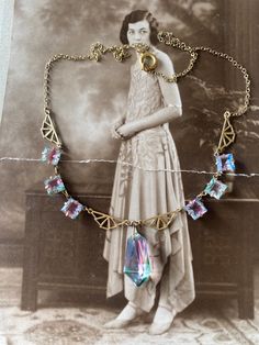 Pretty vintage lavaliere necklace from the Art Deco period 1928-1932 when Iris glass was made using crystal and adding colour to imitate a rainbow in an example here so very typical of the Art Deco period with pendant fringing between crystal rhinestones set in cases all set on a pretty gold tone chain with complimenting spacers.  Measures 41 cm all round with an additional drop for centre pendant of nearly 6 cm with original clasp.  Please note all boxes and decorations are for display only and Rainbow Crystal, Summer Necklace, Art Deco Period, Wedding Jewellery Necklace, Wedding Necklace, Vintage Art Deco, Crystal Pendant, Bead Necklace, Crystal Rhinestone