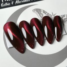 Welcome to LD Nails! 🖤 One set of 10 REUSABLE Press On Nails 🖤 🖤 Made to order in your shape & size 🖤 Ruby Cat Eye: gorgeous Ruby Red cat eye press on nails. Done in a classic slant effect, but can be requested with any cat eye magnet effect you see in my shop! 😍 If you’d like a different effect please leave the name in the personalization box! Purchase INCLUDES an application kit! It consists of: 🖤 detailed application & removal instructions 🖤 a sealed and sanitary mani kit (100/180 file, buffer block, cuticle pusher) 🖤 2 alcohol pads 🖤 nail tabs or glue (glue is standard, request tabs in the personalization box if you prefer them!) *Only one kit is sent per order. Extra kits and kit contents can be picked up separately Est. 2020: LD Nails specializes in custom Gothic, Witchy and Cat Eye Nails Burgundy, Cat Eye Nails Winter, Dark Red Cat Eye Nails, Red Cat Eye, Alcohol Pads, Country Nails, Nails Done