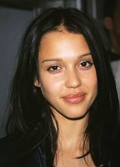 a close up of a person with long hair