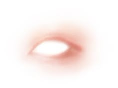 a blurry image of an object in the sky with red and white light coming from it