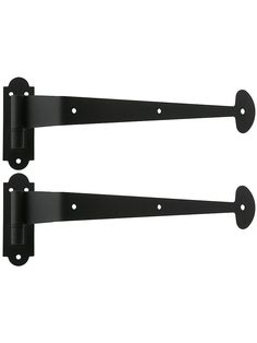 two black metal brackets with holes on each side and one is holding the door handle