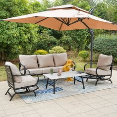 patio furniture with an umbrella over it