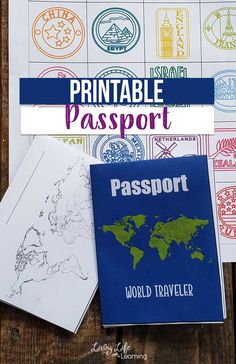 the printable passport is sitting on top of a wooden table with stamps around it