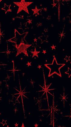 red and black stars on a dark background