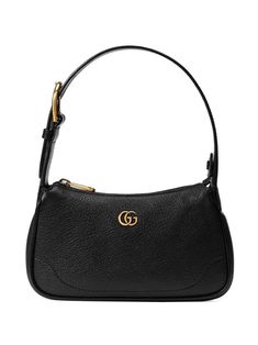 Aphrodite shoulder bag from Gucci featuring black, leather, logo plaque, top zip fastening and adjustable shoulder strap. This item is in size UNI and the color is Black Fancy Bags, Pretty Bags, Designer Shoulder Bags, Mini Shoulder Bag, Gucci Black, Cute Bags, Gucci Handbags, Small Shoulder Bag