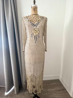 Insane and rare 1980s beaded dress. Dress is made of silk fabric and lining and fully beaded all of the way down. Open back and amazing cutouts at the hem that show a bit of skin.  Missing a few beads here and there but not even noticeable. In very good vintage condition.  Best for a size 4. Shown on a U.S. size 6 mannequin. Floral Beaded Dress, Half Moon Bay, Beaded Dress, Half Moon, Dress Clothes For Women, Silk Fabric, Dress Outfits, Size 4, Size 6