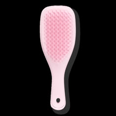 The Mini Ultimate Detangler Hairbrush - MINI ULTIMATE DETANGLER MILLENNIALBenefitsPatented teeth have two-tiered technology with added flex for wet hair. The long, flexible teeth detangle, removing knots and reducing breakage, while the short teeth smooth, for glossy, frizz-free hair.Although small, it confidently detangles any type of hair, helping to reduce hair breakage.You can use on dry or wet hair, it's great for detangling ends and fringes and for distributing conditioning treatments through wet hair.FeaturesThe Ultimate Detangler is the perfect size for travel, and has a savvy keyring hole on the handle that allows you to clip to your bag.Don't be fooled by the size, this hairbrush confidently detangles wet and dry hair. - The Mini Ultimate Detangler Hairbrush Cute Mini Hair Brush, Preppy Hair Brush, Coquette Hair Products, Mini Tangle Teezer, Affordable Wishlist, Cute Hairbrush, Pink Hairbrush, Tangle Teezer Brush, Emergency Kit Bag