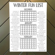 a printable winter fun list hanging on a wall