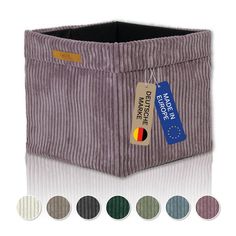 the corded storage bin is shown with four different colors and labels on each side