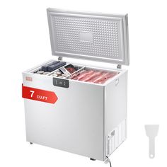 an image of a chest freezer with meat in it