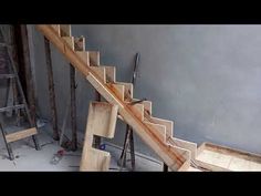 the stairs are made out of wood and metal