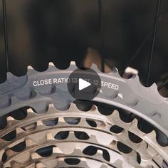 close up of a bicycle wheel with the words close to speed on it's side