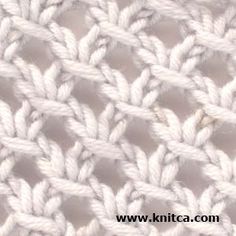 the crochet stitchs are white and have been made into an afghan pattern