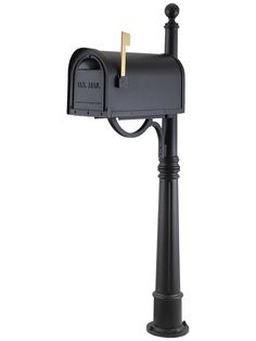 a black mailbox with a gold post