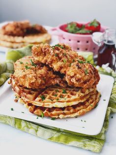 fried chicken and waffles on a white plate