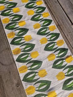 FREE WORLDWIDE SHIPPING  Such a delightfully happy springtime table runner! Retro Scandinavian linen table runner with yummy yellow tulips and their green stems gracing the runner in two rows down the center. Would be incredible for Easter.  Screen printed on high quality linen. A piece of Scandinavian Easter yumminess!  The runner measures 91cm in length and 23cm in width.  The piece is in perfect vintage condition. Handwash only, iron still damp.   To browse my full collection of table runners Spring Table Runners, Tulip Table Runner, Scandinavian Easter, Scandinavian Table Runners, Fun Table Runner, Flower Table Runner, Vintage Easter Decor, Scandinavian Table, Retro Scandinavian