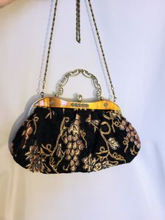 "Gorgeous rare find very elegant cocktail dressy handbag. Antique gold all metalwork. Decorative handle and unique closure with rhinestones. Removable 24\" chain strap. Very decorative amber color acrylic panel. Size:  13\" x 8\" One zippered pocket inside. Perfect condition, Excellent gift. FREE SHIPPING Thank you for visiting my store. You can also visit my MargaretJewelryShop or http://jewelryandclothing.net/ Please read \"The Private Policy\"" Antique Gold Embroidered Bags, Elegant Clutch Evening Bag For Vintage Events, Antique Embroidered Evening Bags, Elegant Beaded Evening Bag For Vintage Events, Gold Clutch Evening Bag For Cocktail, Victorian Style Gold Embroidered Bag, Glamorous Gold Embroidered Evening Bag, Formal Gold Embroidered Evening Bag, Vintage Embroidered Evening Bags