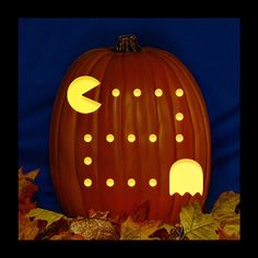 a carved pumpkin with glowing eyes on it