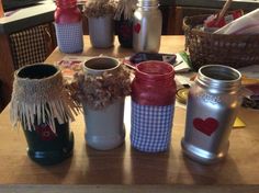 the jars are decorated with hearts and burlocks on them for valentine's day