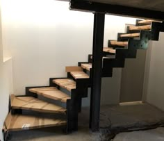 a set of stairs in an unfinished room