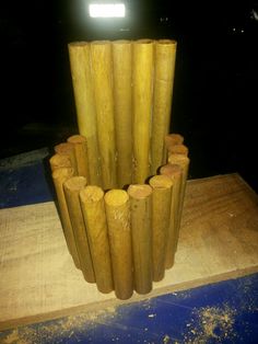 a bunch of wood sticks stacked on top of each other