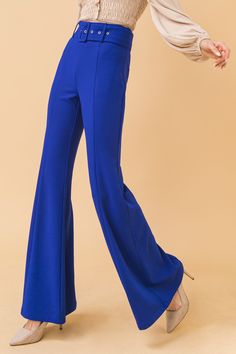 A solid woven flared pant featuring bell bottom, self belt with rectangular buckle, and side pockets Details Self: 95% Polyester, 5% Spandex Size & Fit - Model is 5`8" And Wearing Size Small - Measurements Taken From Size Small - Approx Length: 43.5" Elegant Stretch Flares, Chic Blue Fitted Flares, Chic Blue Wide-leg Flares, Elegant Wide Leg Stretch Flares, Chic Stretch Blue Flares, Chic Blue Full-length Flares, Formal Flare Bottoms Made Of Elastane, Blue Flare Pants In Elastane, Formal Flare Bottoms In Elastane