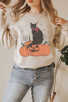 This Vintage Halloween Cat Sweater is a perfect for this Spooky Season of Halloween 2022. Get this Vintage Black Cat Sweatshirt for Trick or Treat, Halloween Party, Fall party or Thanksgiving for your friends or family who loves cats. Also available on tshirt, sweatshirt and hoodies: https://www.etsy.com/shop/TheNims?search_query=Halloween+Cat For other halloween items, click here: https://www.etsy.com/shop/TheNims?section_id=30049468 Browse through my other awesome items here: http://thenims.et Cat Mom Sweatshirt, Vintage Black Cat, Spooky Cat, Chat Halloween, Pumpkin Sweatshirt, Halloween Crewneck, Cat Sweater, Pumpkin Sweatshirts, Halloween Sweater