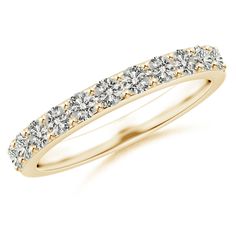 a yellow gold wedding band with five diamonds on the top and bottom, set in 18k