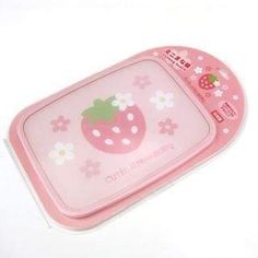 a pink tray with a strawberry design on the front and bottom, sitting on a white surface