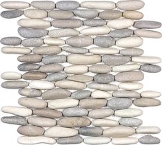 several white and gray rocks are arranged in the shape of a vertical line on a white background