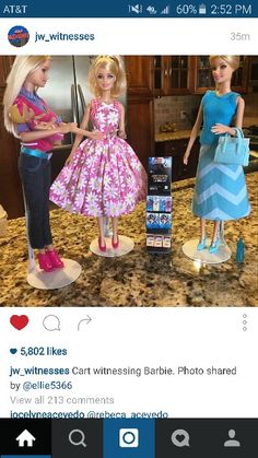 three barbie dolls are standing in the kitchen