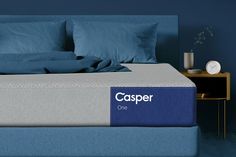 the casperer one mattress is made up and ready to be used as a bed