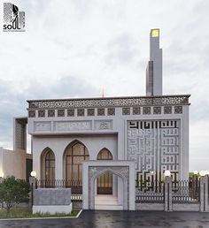 a large white building with a clock on it's side