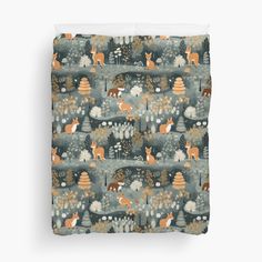 an animal themed bedding set with foxes and trees