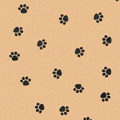 black and white dog paw prints on tan background