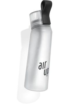 an air up water bottle hanging from the ceiling with its lid open and black cap